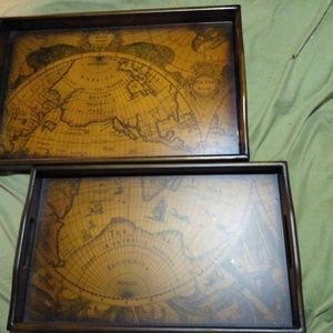 Two stacking trays with world map on them